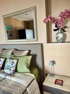 Appartements Appartement Jardin exotique : photos des chambres