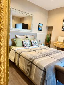 Appartements Appartement Jardin exotique : photos des chambres