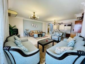 Family-Friendly 3BR Apartment in Rehab City