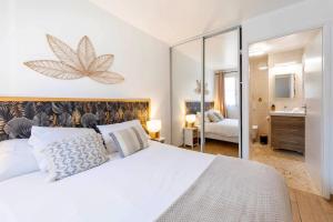 Appartements Sejour magique a 10 min de Disneyland- Appartement cosy avec terrasse & parking prive : photos des chambres