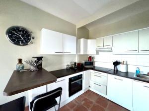 Appartements Appartement Jardin exotique : photos des chambres