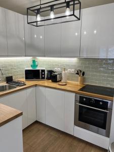 Appartements Sejour magique a 10 min de Disneyland- Appartement cosy avec terrasse & parking prive : photos des chambres