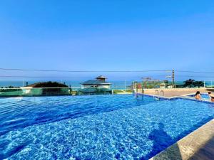 Homeclub com área de lazer, 50m da praia