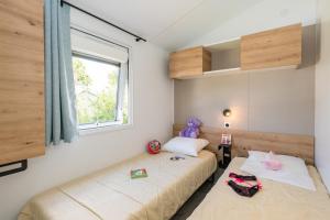 Campings Camping maeva Respire de la Baie : photos des chambres