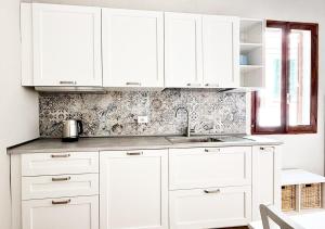 Pgs Immobiliare srls Residenza Cairoli 03 bilocale in centro storico La Maddalena