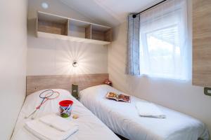 Campings Camping maeva Respire de la Baie : photos des chambres