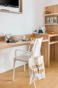 Appart'hotels Appart hotel Q7 Lodge Lyon 7 : photos des chambres