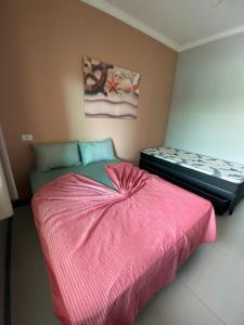 Casa com piscina aquecida a 300m da praia