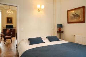 Appartements Le jardin de L-Hippodrome : photos des chambres