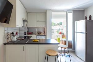 Chez Hélène - Charmant deux pièces climatisé avec parking privé