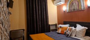 Hotels Hotel L'Etoile Aeroport - A61 : photos des chambres