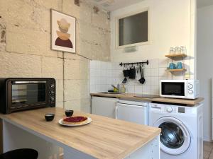 Appartements Terracotta - Quai de la Loire - Cozy : photos des chambres