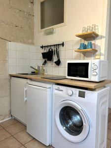 Appartements Terracotta - Quai de la Loire - Cozy : photos des chambres