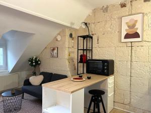 Appartements Terracotta - Quai de la Loire - Cozy : photos des chambres