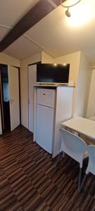 Campings Mobilhomes Cozy 2 ou 3 chambres en bordure d-etang Camping 3 etoiles : photos des chambres
