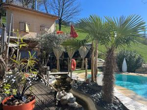 B&B / Chambres d'hotes a La Marc'Quize chambres d'hotes, piscine a debordement en exterieur et partagee, bain nordique a 38 degres en prestation supplement sur reservation horaire anticipee 1 place de parking sur reservation horaire et anticipee : photos des chambres