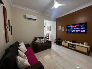 Lindo apartamento com vista lateral mar BR 40-302