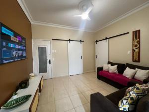 Lindo apartamento com vista lateral mar BR 40-302