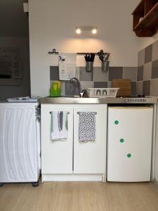 Appartements Tiny house a 50m de la plage de Miomo : photos des chambres