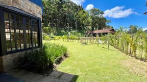 Casa 02 Vale Boa Vista - Casa em Condomínio Exclusivo com Vista para as Montanhas e Área de Lazer Completa