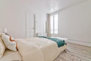 Appartements La Pause Detente au pied du Stade de France : photos des chambres