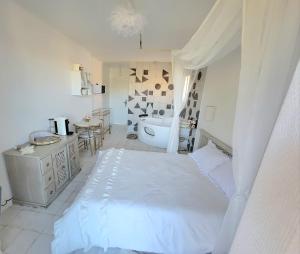 Appartements Love room Les Tourtereaux : photos des chambres