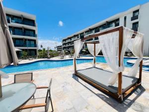 Flat em Muro Alto - Porto de Galinhas - MAKIA A303 - By Anfitrião Legal