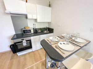 Appartements T2 Sweet Horizon - Groupama, LDLC, Euroexpo, Grand Large : photos des chambres