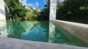 Casa Itzamna Jungle Retreat Tulum - Francisco Uh May