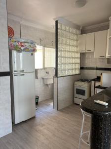 Praia Grande, Guilhermina 2 quartos e sem wi-fi