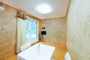 Riverside Forest Pension Camping