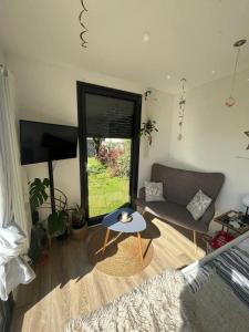 Chalets Chalet accueillant a Saint-Vincent-de-Tyrosse avec jardin : photos des chambres