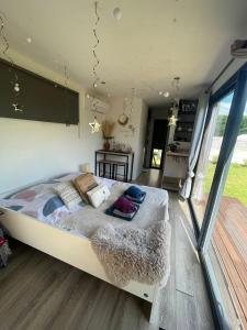 Chalets Chalet accueillant a Saint-Vincent-de-Tyrosse avec jardin : photos des chambres