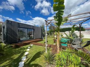 Chalets Chalet accueillant a Saint-Vincent-de-Tyrosse avec jardin : photos des chambres