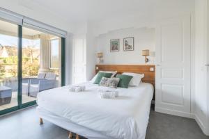 Appartements Le Golfeur - Parking - 100m Golf : photos des chambres