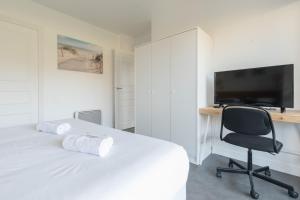 Appartements Le Golfeur - Parking - 100m Golf : photos des chambres