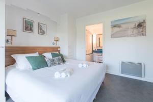 Appartements Le Golfeur - Parking - 100m Golf : photos des chambres