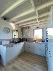 Maisons de vacances La vigie maison les pieds dans l-eau : photos des chambres