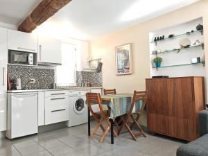 Appartements La maison aux volets bleus : photos des chambres