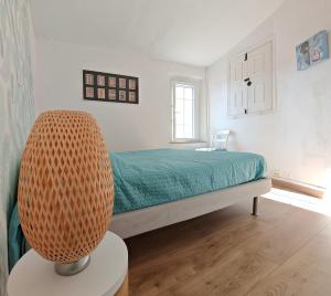 Appartements La maison aux volets bleus : photos des chambres