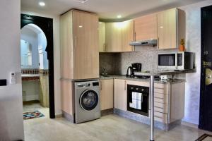 In Gueliz, Chic and Ethnic with a palm view