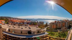 Sanxenxo, Apartamento 1 hab con vistas al mar, piscina, garaje y a 150 mts de la Playa Silgar
