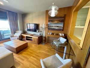 Sanxenxo, Apartamento 1 hab con vistas al mar, piscina, garaje y a 150 mts de la Playa Silgar