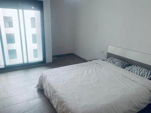 Appartement avec une Chambre, Salon, Salle de Bain et Piscine