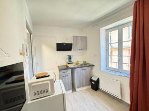 Appartements Petit studio, fonctionnel 2B : photos des chambres