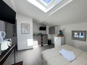 Appartements Petit studio, fonctionnel 2C : photos des chambres