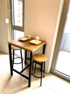 Appartements Cozy studio avec balcon aux portes de Geneve : photos des chambres