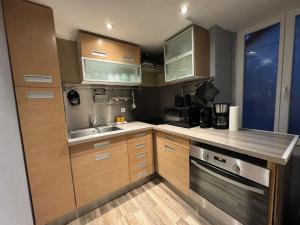 Appartements T3 terrasse-parking Groupama Stadium LDLCArena : photos des chambres