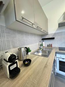 Appartements Superbe T2 a 15 min de Lyon : photos des chambres