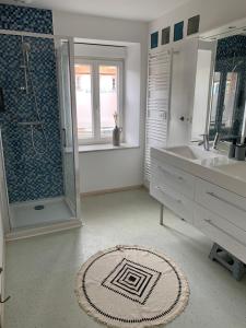 Appartements Les Rives du Chateau, 90m2, vue sur le canal : photos des chambres